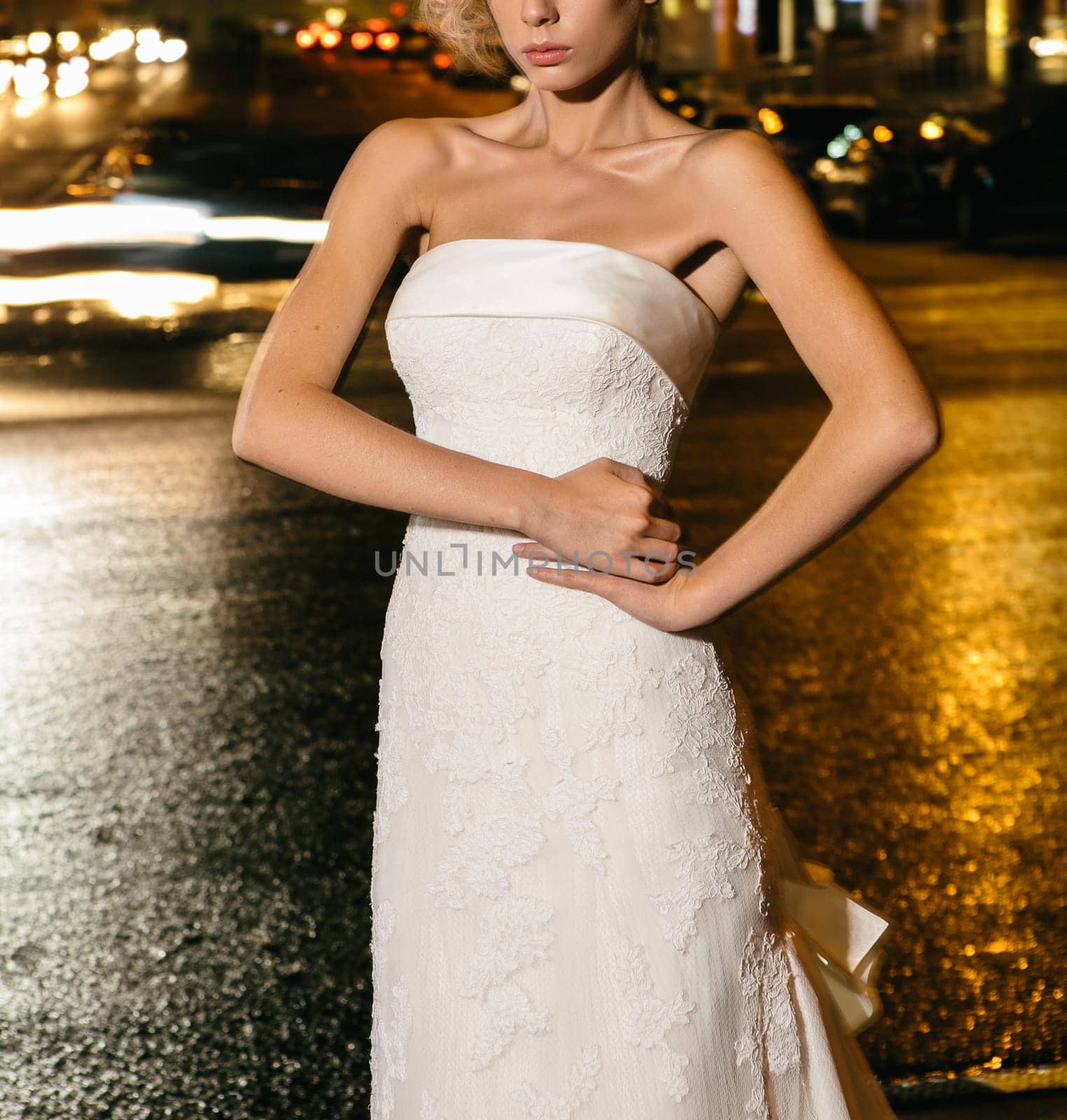 Beautiful bride on street in the night. Street fashion