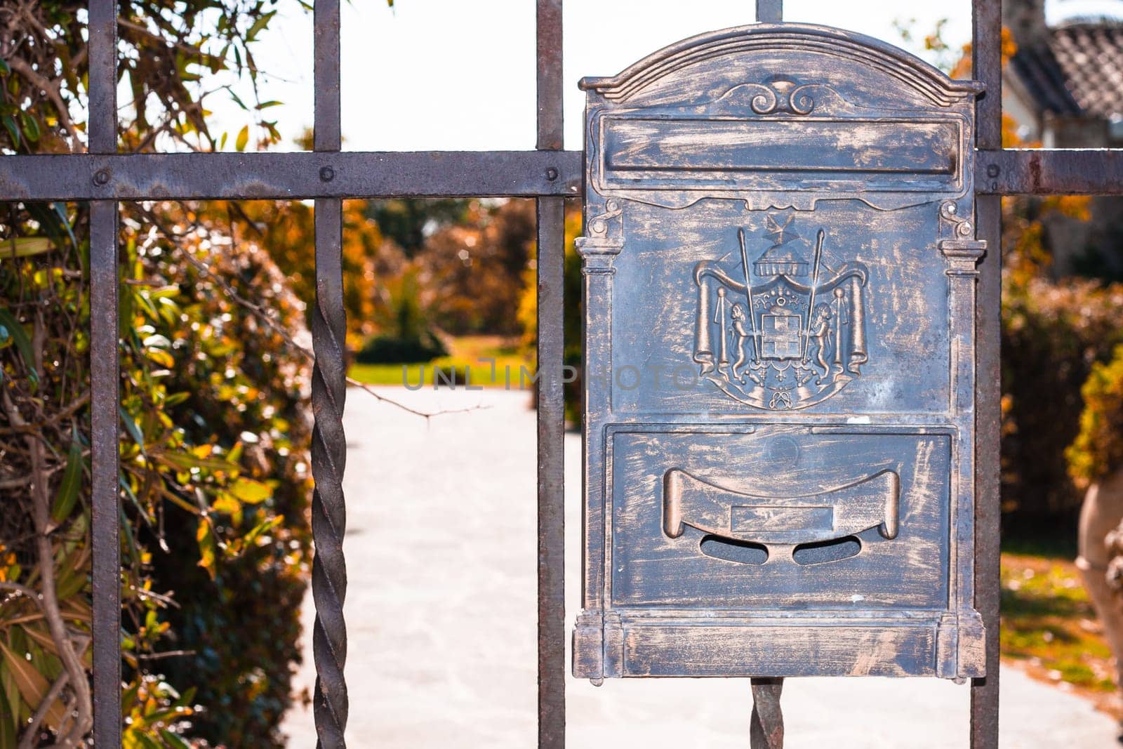 Letter box wrought iron with decorations .