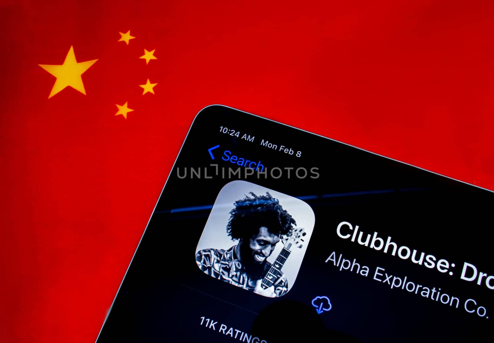 Calgary, Alberta. Canada. Feb 8, 2021. An iPad with the Clubhouse application and the chinese flag on the background.