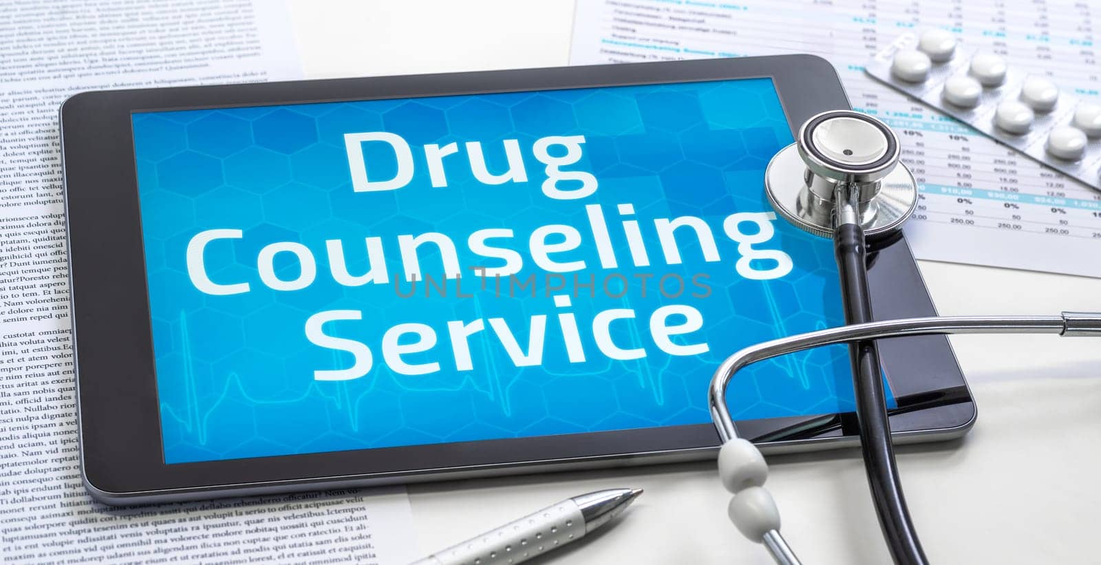 The word Drug Counseling Service on the display of a tablet