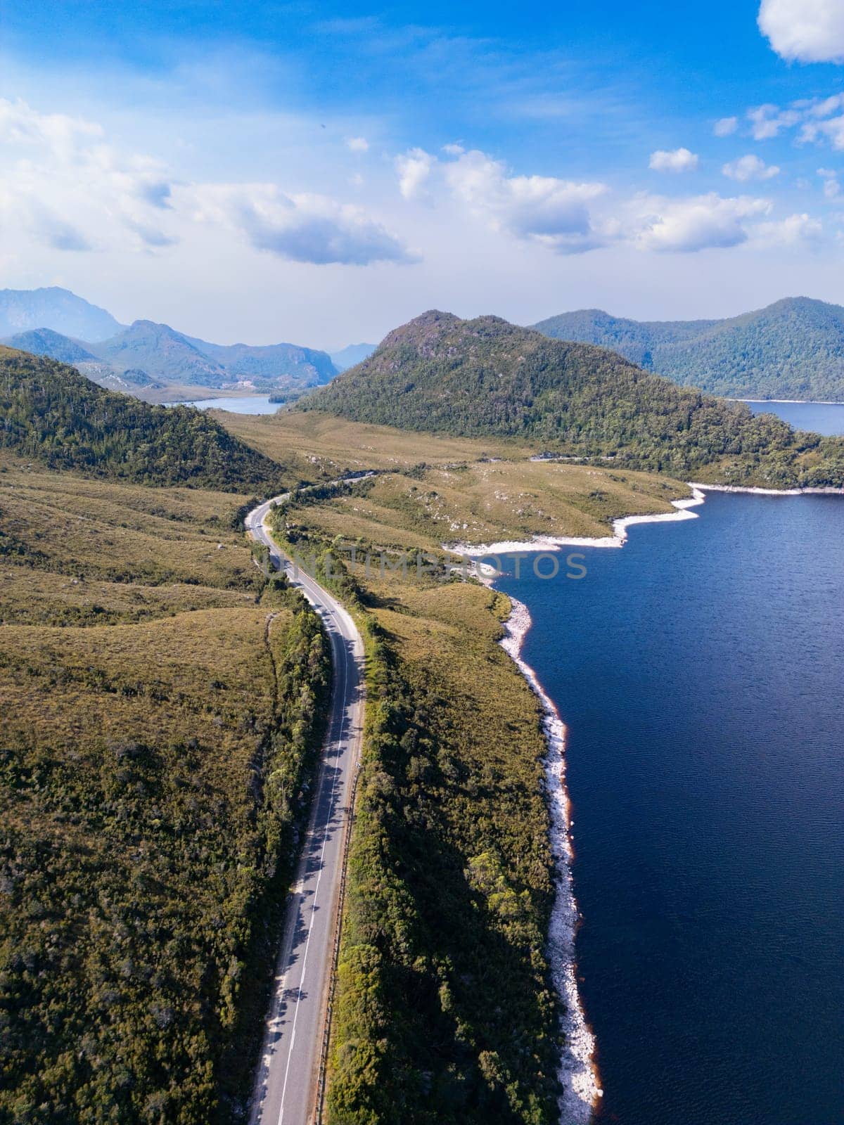 Aerial landscape of Lake Plimsoll on a hot summer's afternoon in Tasmania, Australia