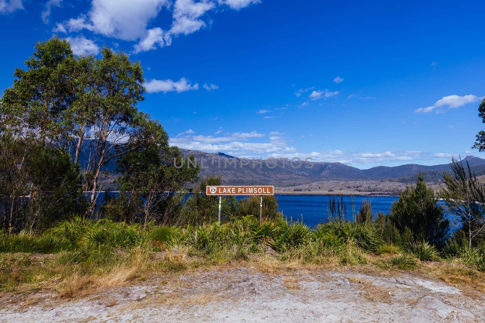 Aerial landscape of Lake Plimsoll on a hot summer's afternoon in Tasmania, Australia