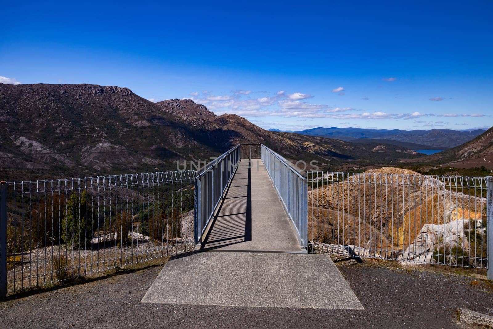 The view of Iron Blow Lookout on a hot summer's afternoon in Queenstown, Tasmania, Australia