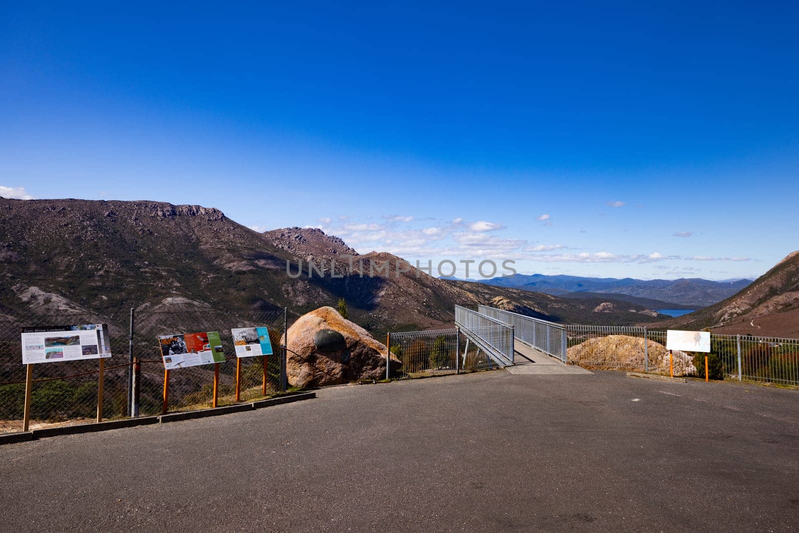 The view of Iron Blow Lookout on a hot summer's afternoon in Queenstown, Tasmania, Australia