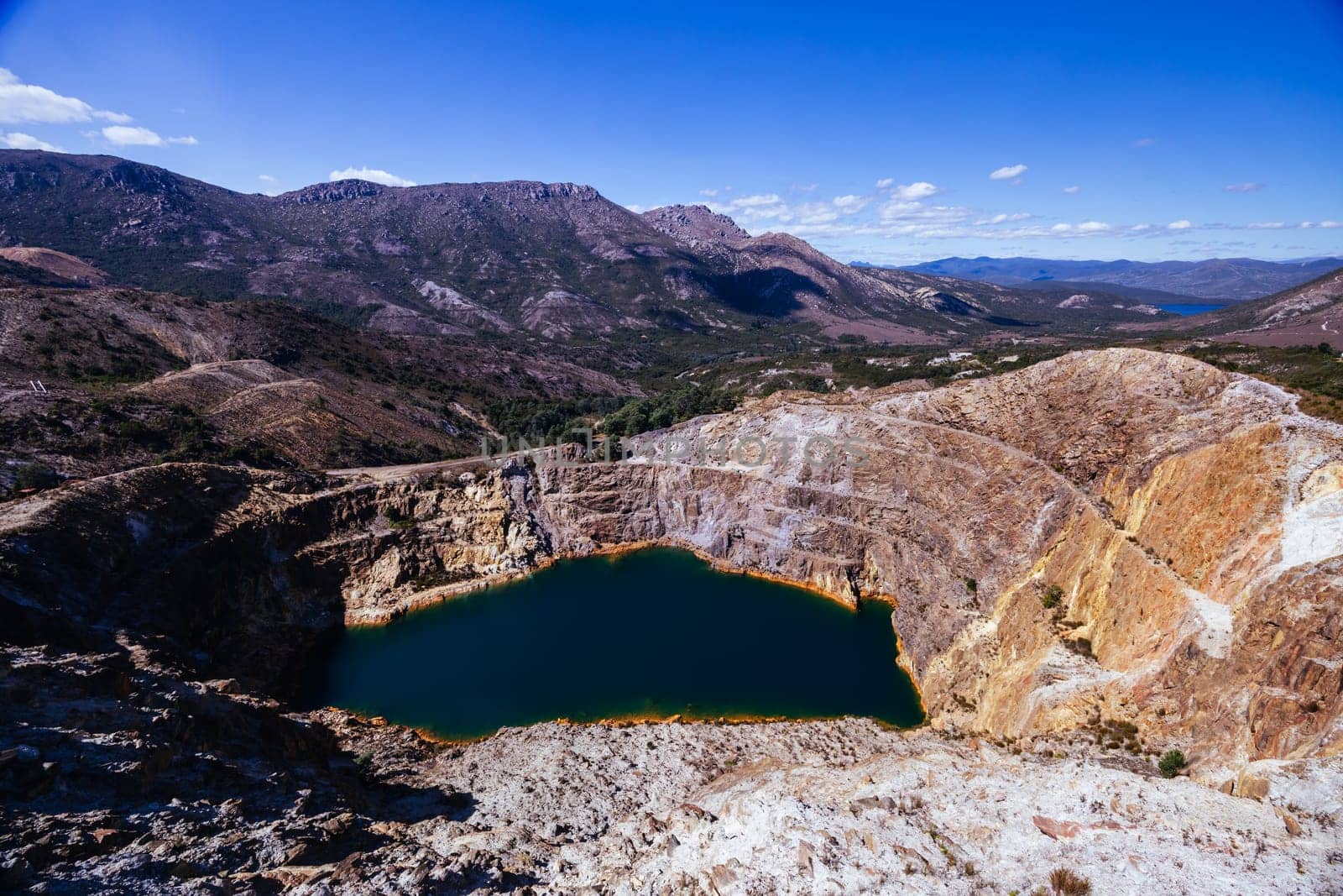The view of Iron Blow Lookout on a hot summer's afternoon in Queenstown, Tasmania, Australia