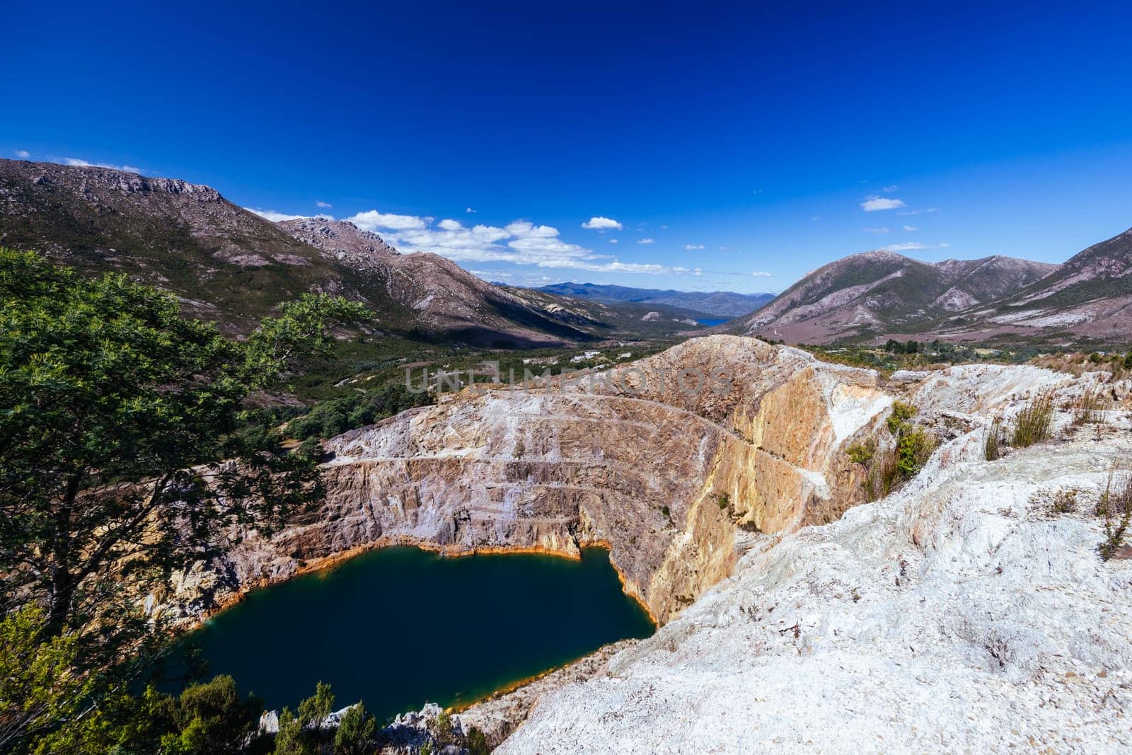 The view of Iron Blow Lookout on a hot summer's afternoon in Queenstown, Tasmania, Australia
