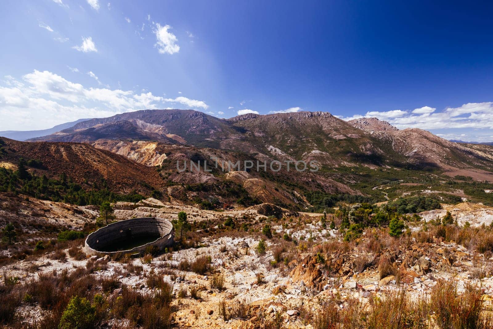 The view of Iron Blow Lookout on a hot summer's afternoon in Queenstown, Tasmania, Australia