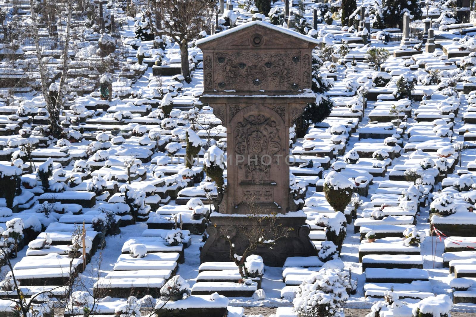The Johannisfriedhof is located in the St. Johannis district of Nuremberg. Adam Kraft's station of the cross was built in 1506-1508. The cemetery is covered with snow in winter.