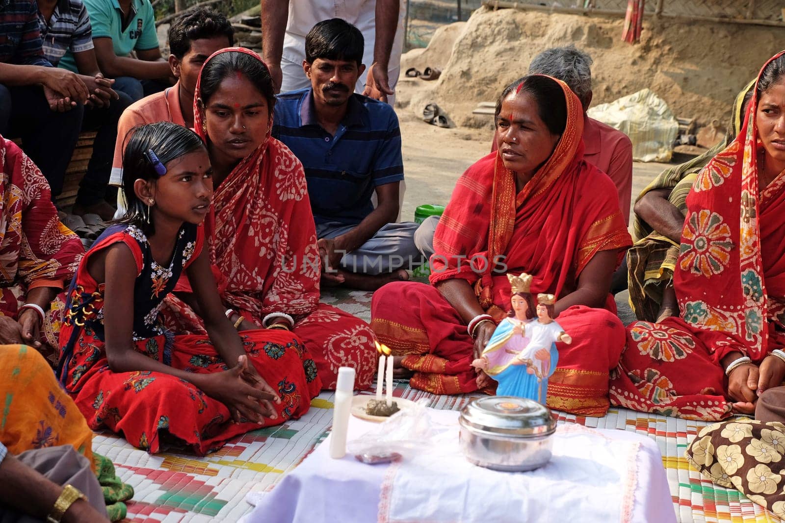Faithful Catholics during an outdoor Mass in the village of Mitrapur, West Bengal, India