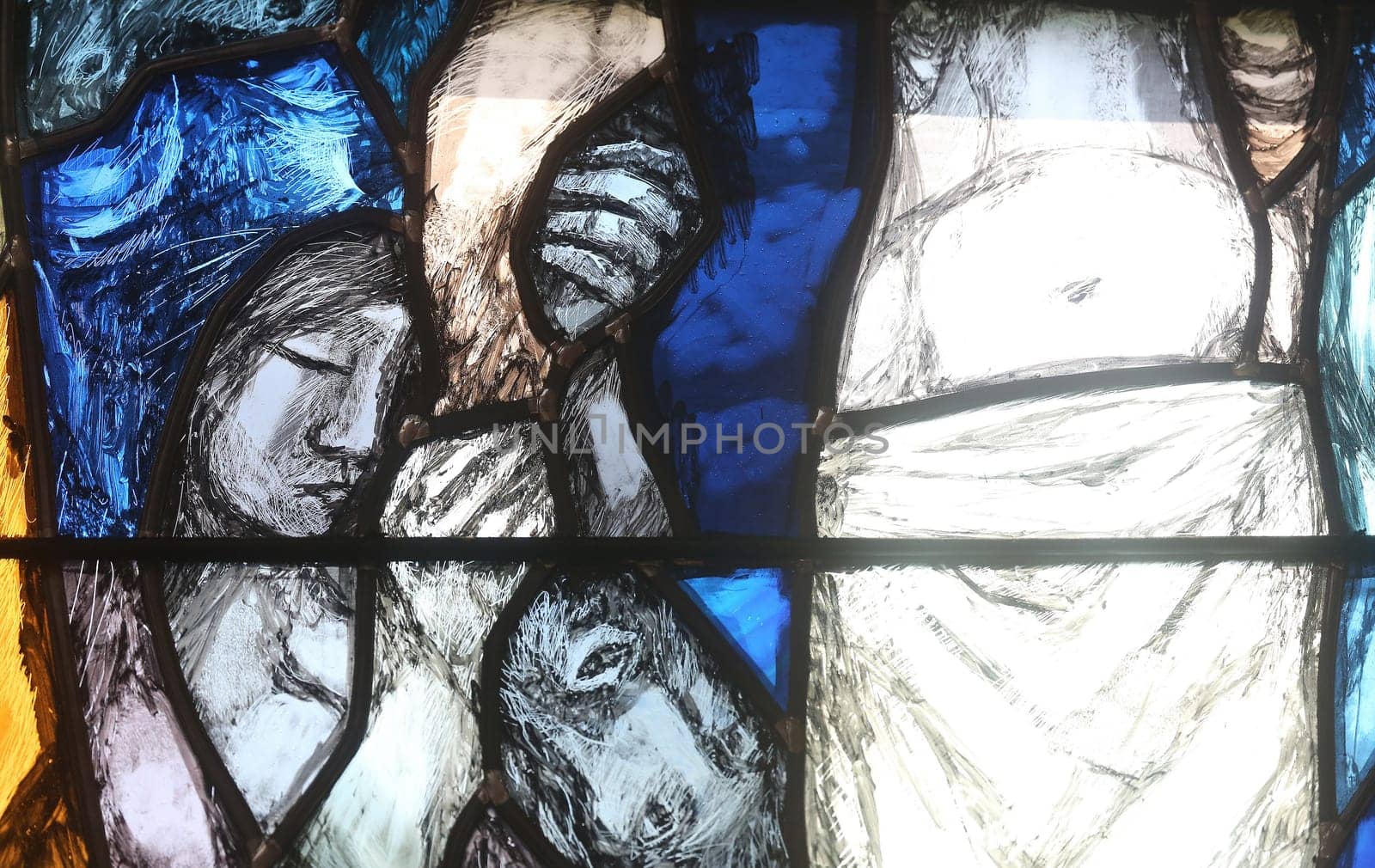 God’s promise gives men courage and hope in the path of their lives and salvation, detail of stained glass window by Sieger Koder in St. John church in Piflas, Germany