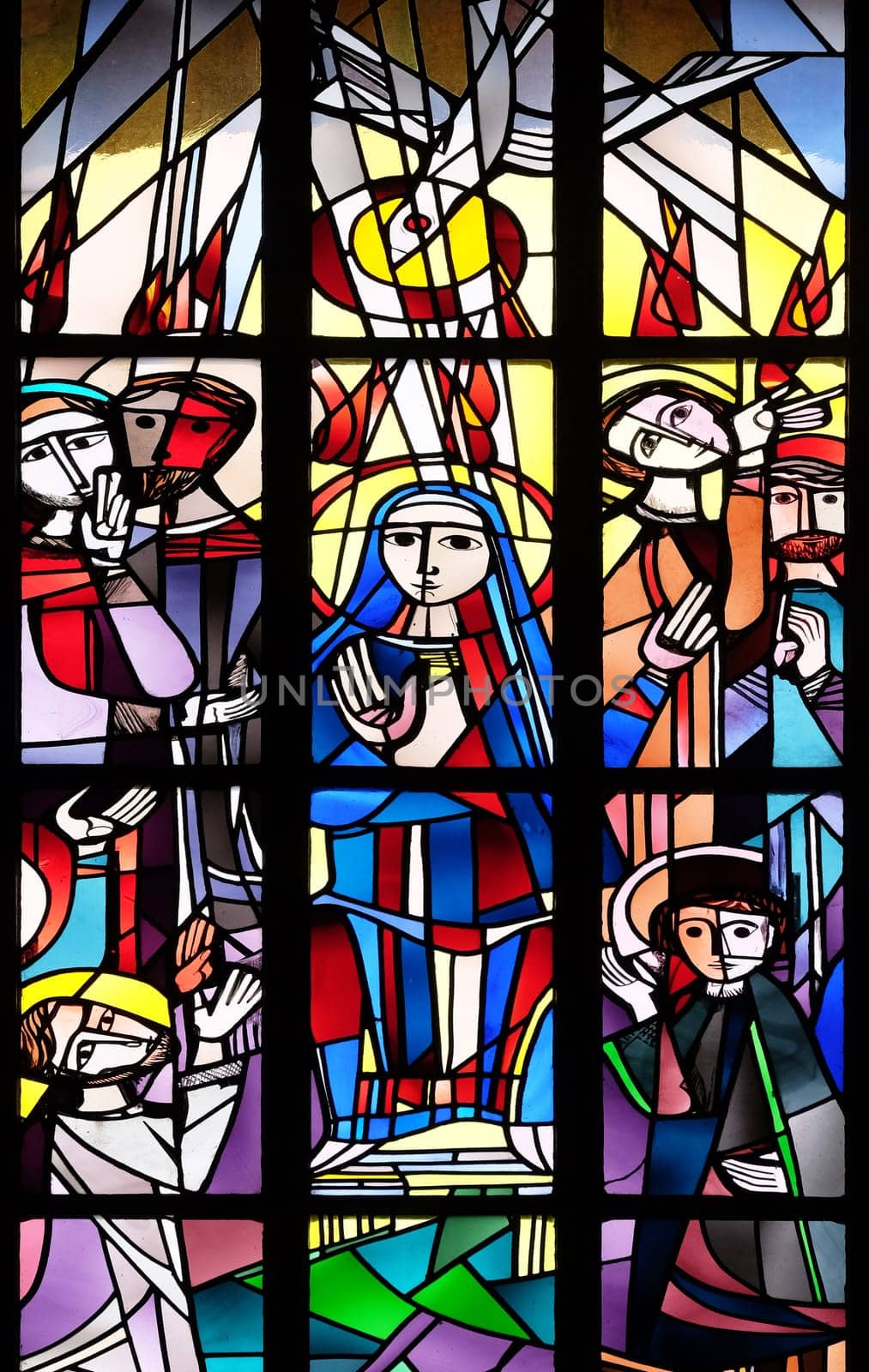 Pentecost stained glass window in the Saint Lawrence church in Kleinostheim, Germany