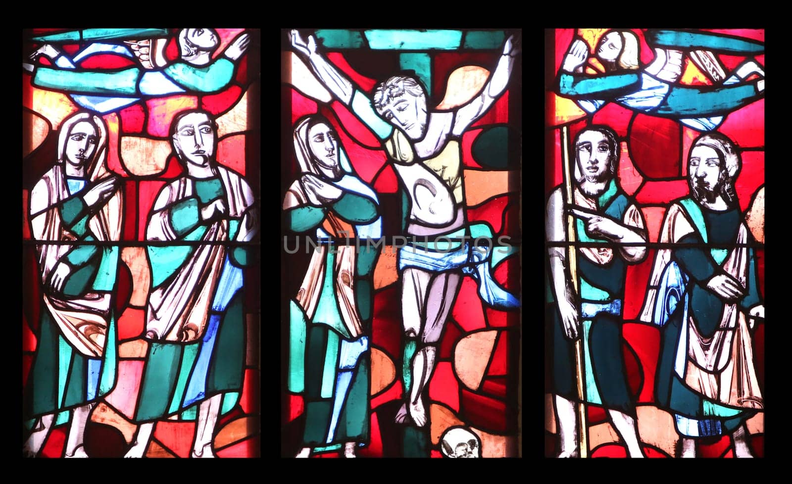 Crucifixion, stained glass window in Basilica of St. Vitus in Ellwangen, Germany