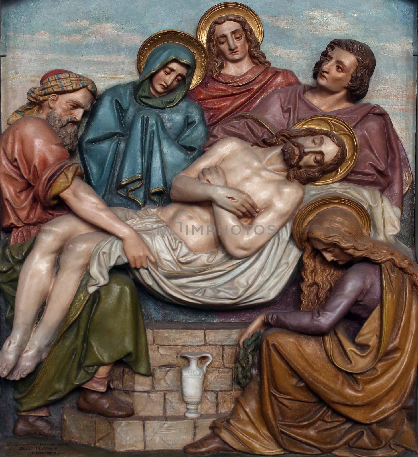 14th Stations of the Cross, Jesus is laid in the tomb and covered in incense, the parish church of St. Peter and Paul in Oberstaufen, Germany