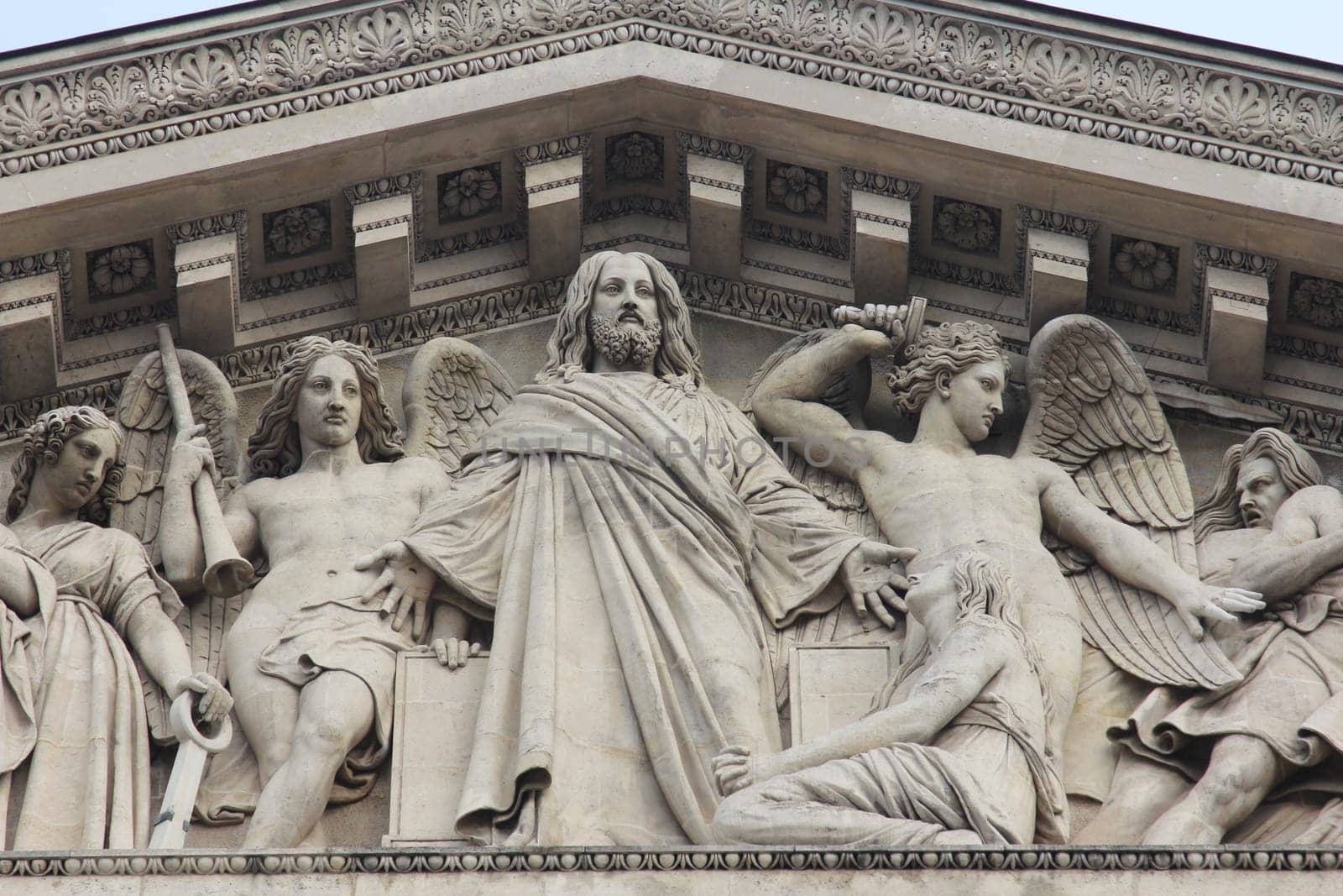 The sculpted tympanum of the church "La Madeleine"", Paris"