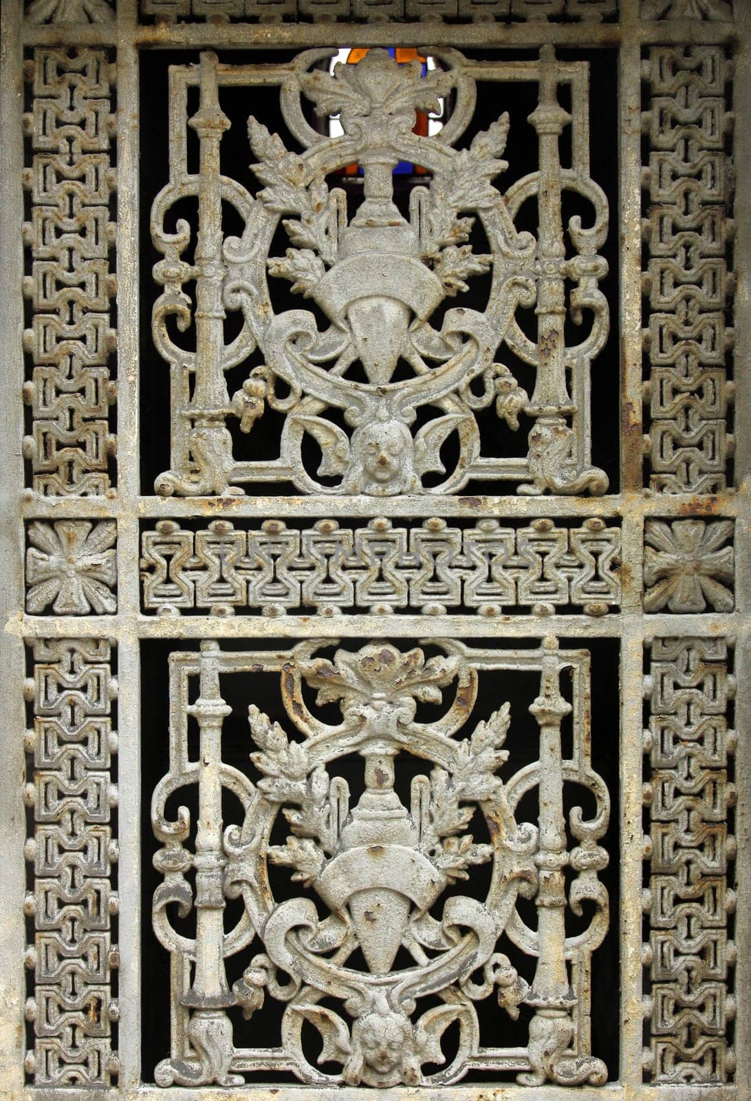 Ornate tomb door at Pere Lachaise cemetery, Paris