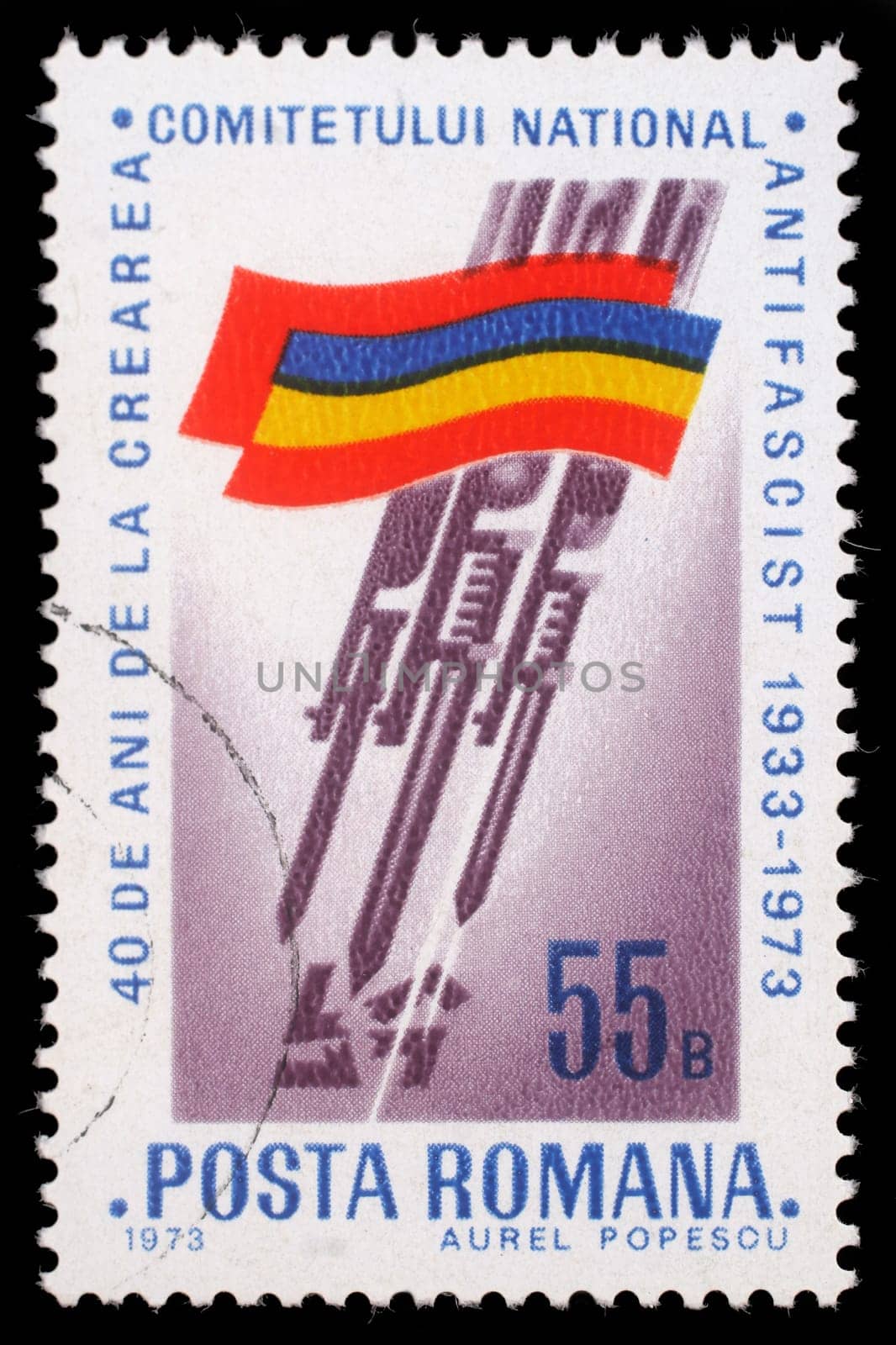 Stamp printed by Romania, shows Romanian flag, Bayonets stabbing Swastika, circa 1973.