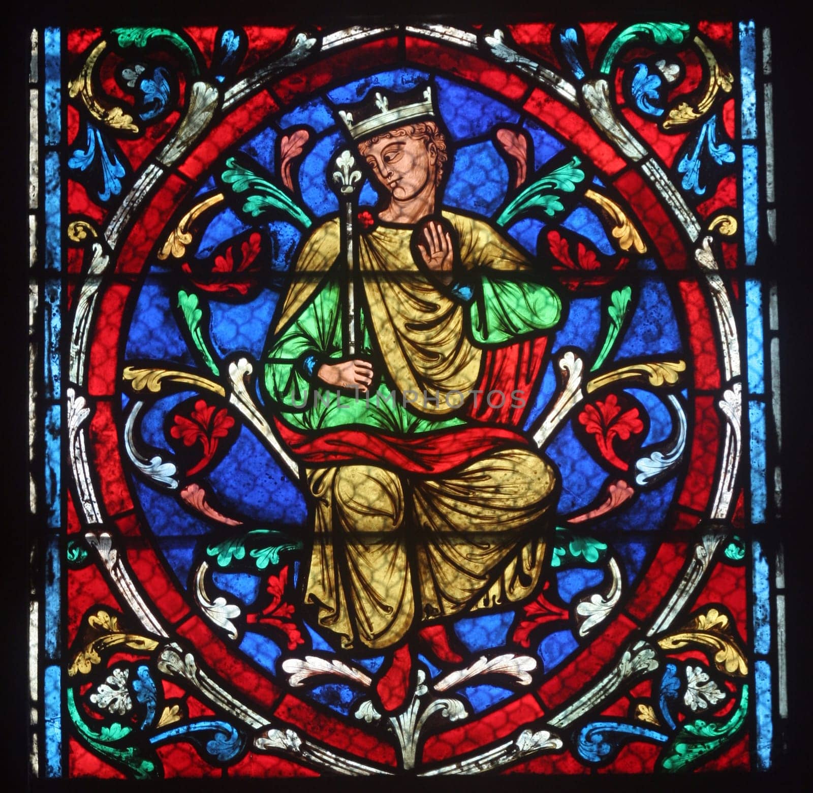 Colorful stained glass window in Cathedral Notre Dame de Paris