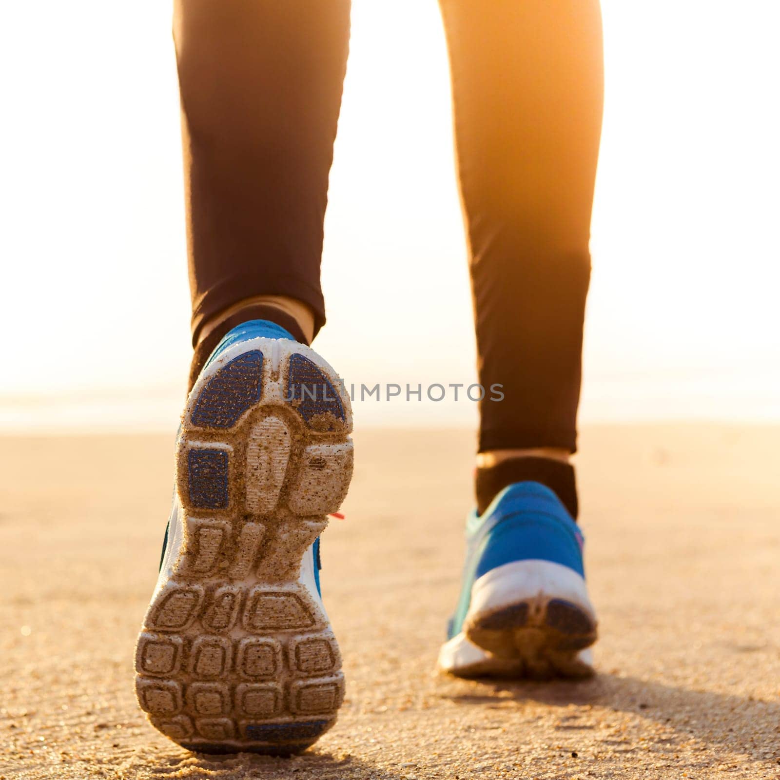 Runner woman tying the shoelaces