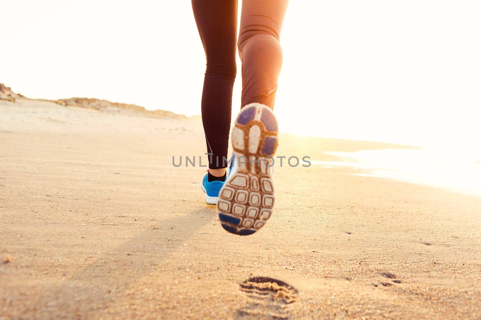 Runner woman tying the shoelaces