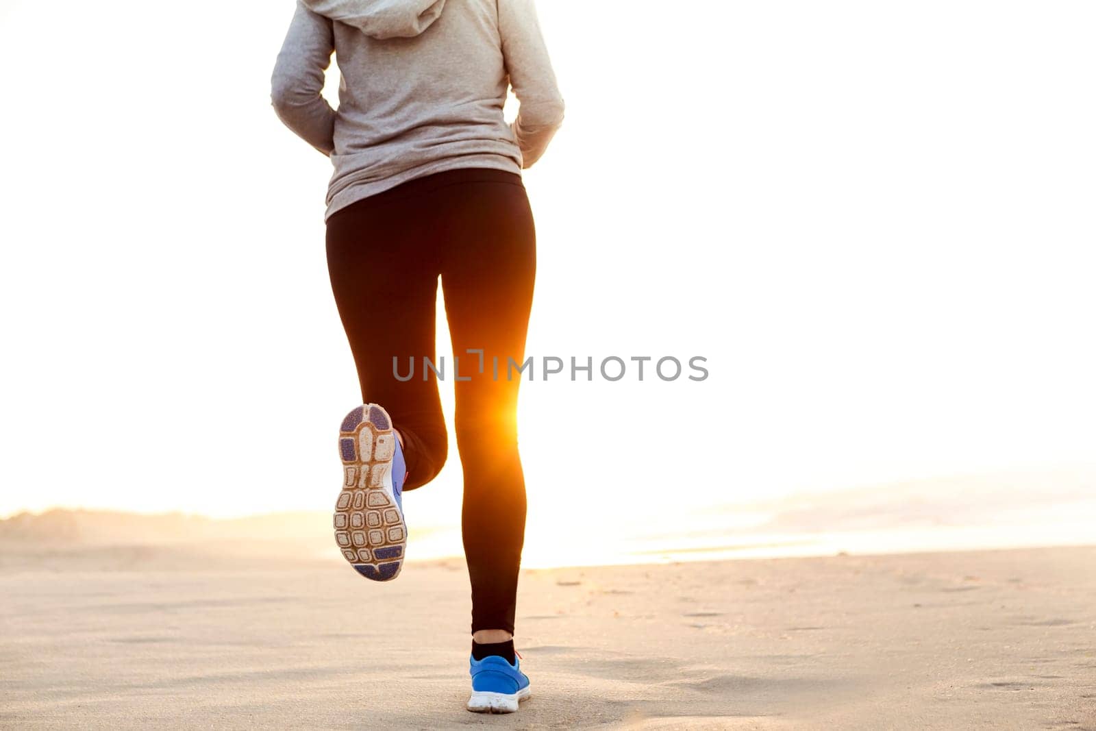Runner woman tying the shoelaces