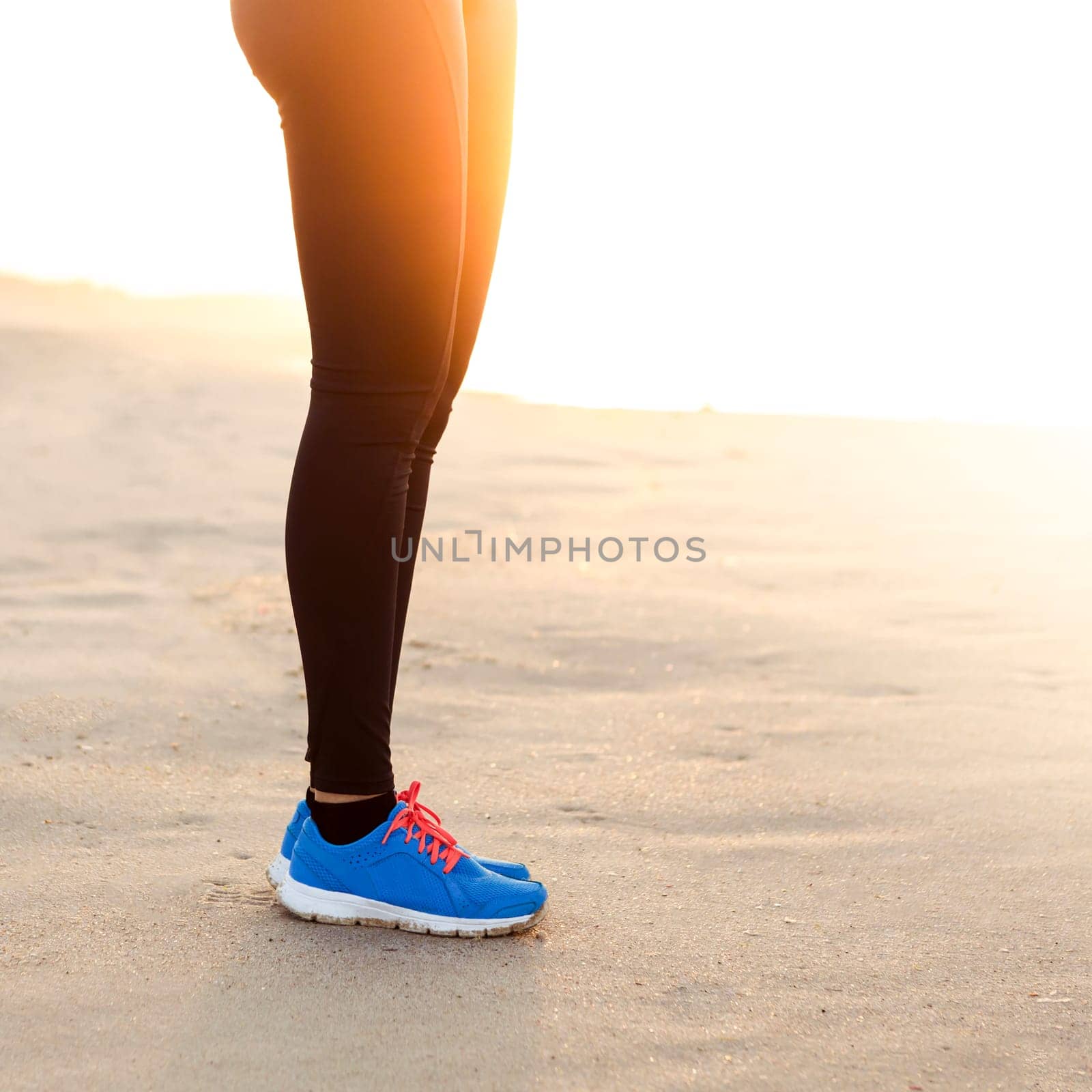 Runner woman tying the shoelaces
