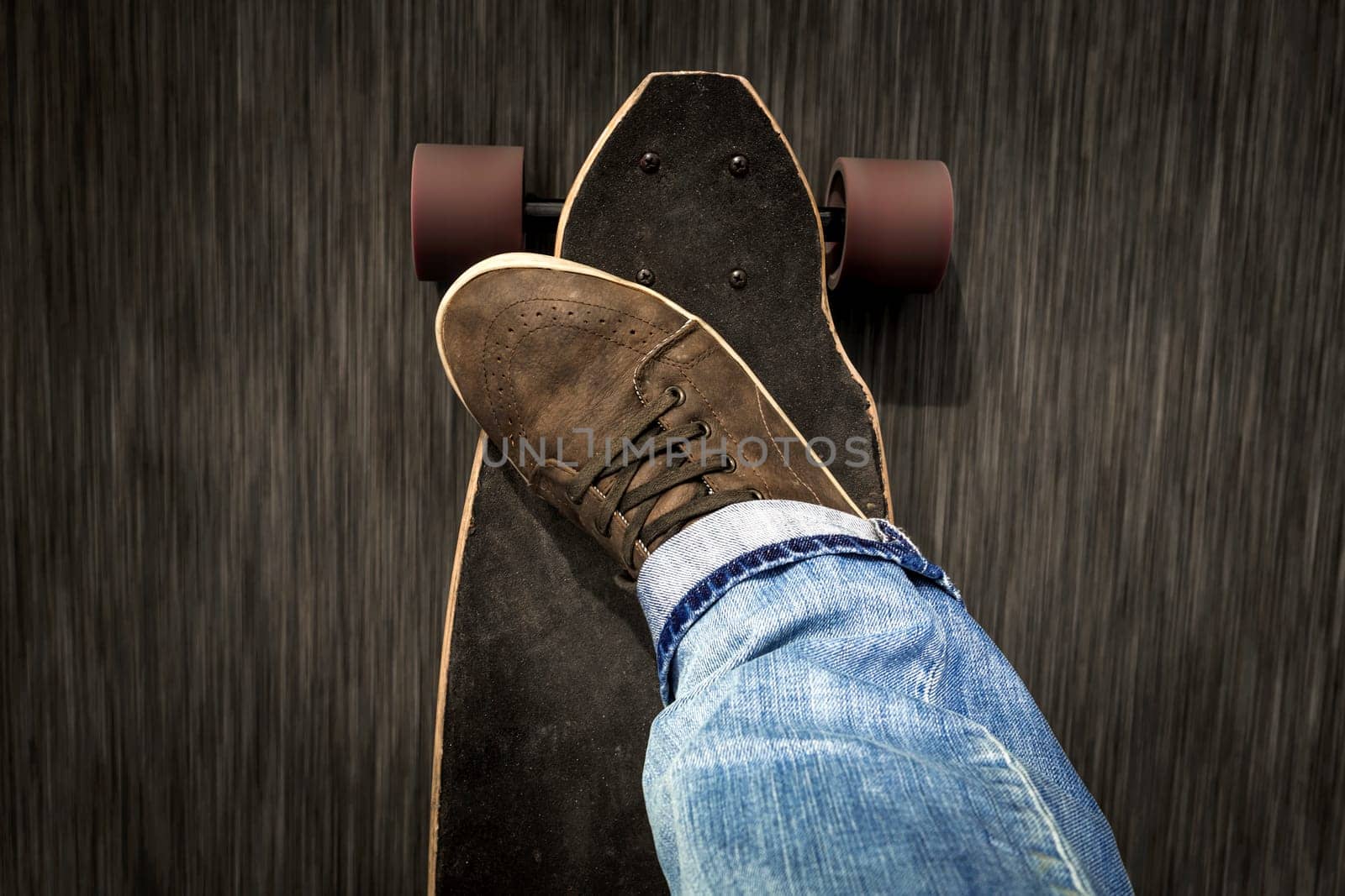 Detail of a young man feet riding a skateboard