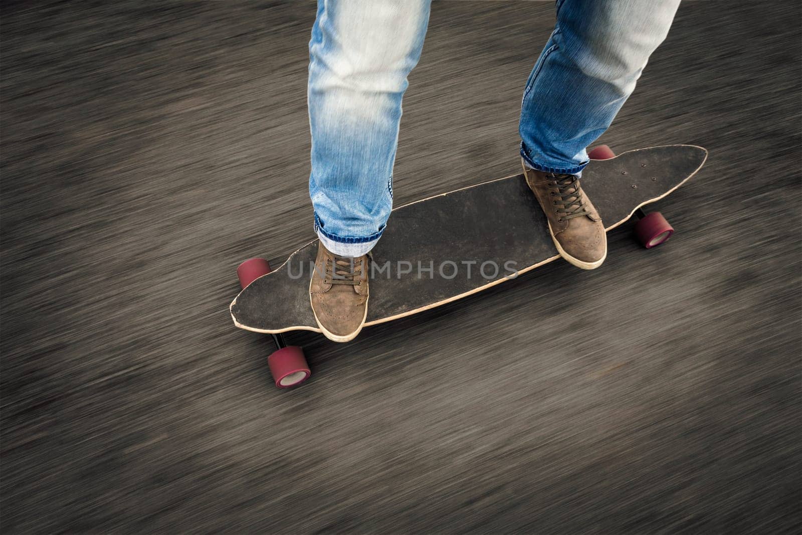 Detail of a young man feet riding a skateboard