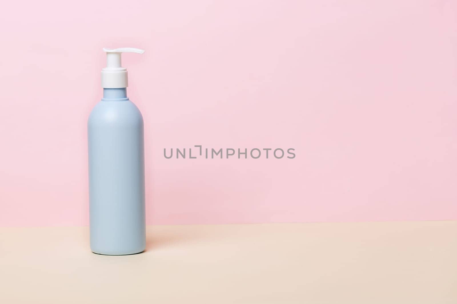 Coronavirus prevention sanitizer gel for hands hygiene, corona virus(covid-19) protection. Antiseptic, Hygiene and Health concept. Minimalist style on pink background