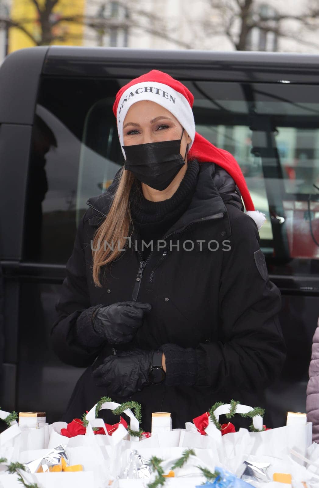 Yasmina Filali, german actress and model  distributed Christmas bags from Hamburger Homeless Aid e.V. to the homeless and needy at Hamburg Central Station