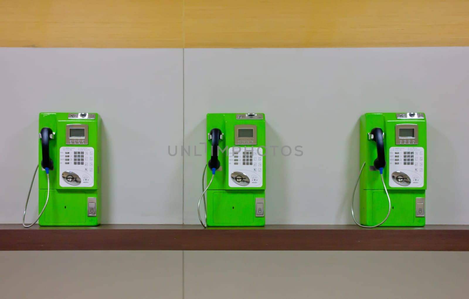 The roll of colorful public phones in the railway station