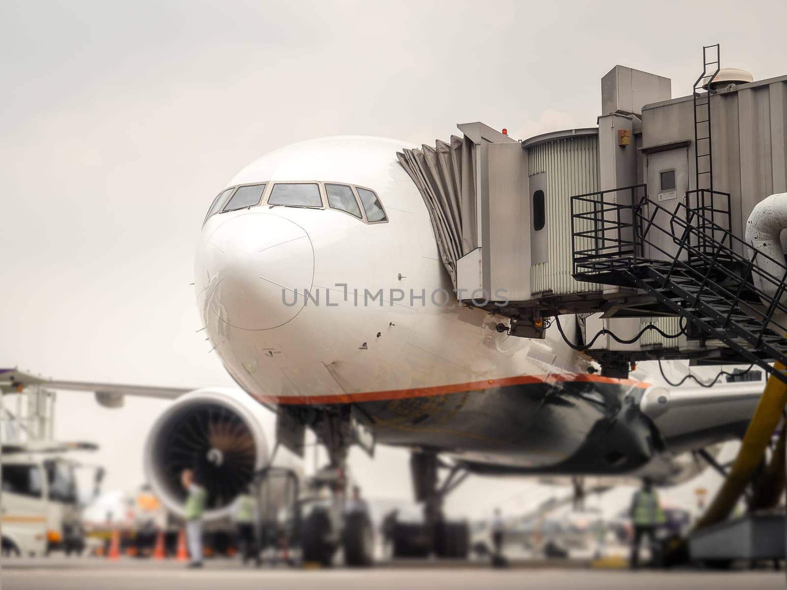 Airplane near the terminal in an airport cockpit