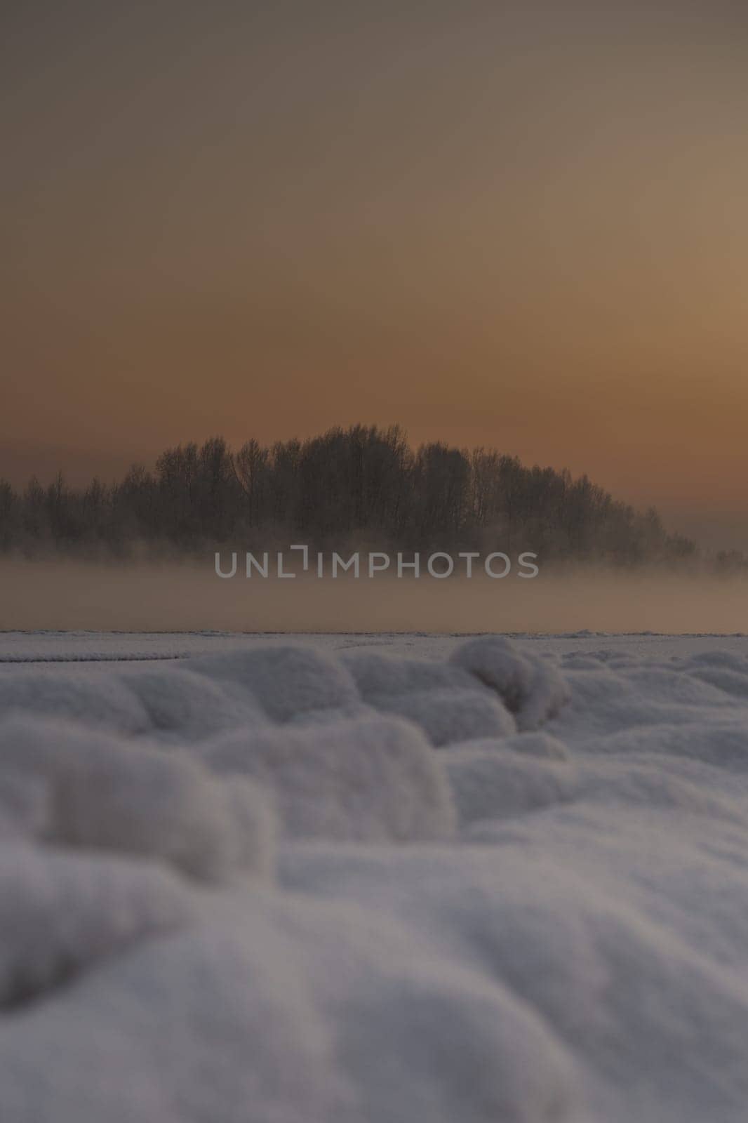 Wonderful winter sunset over the river.