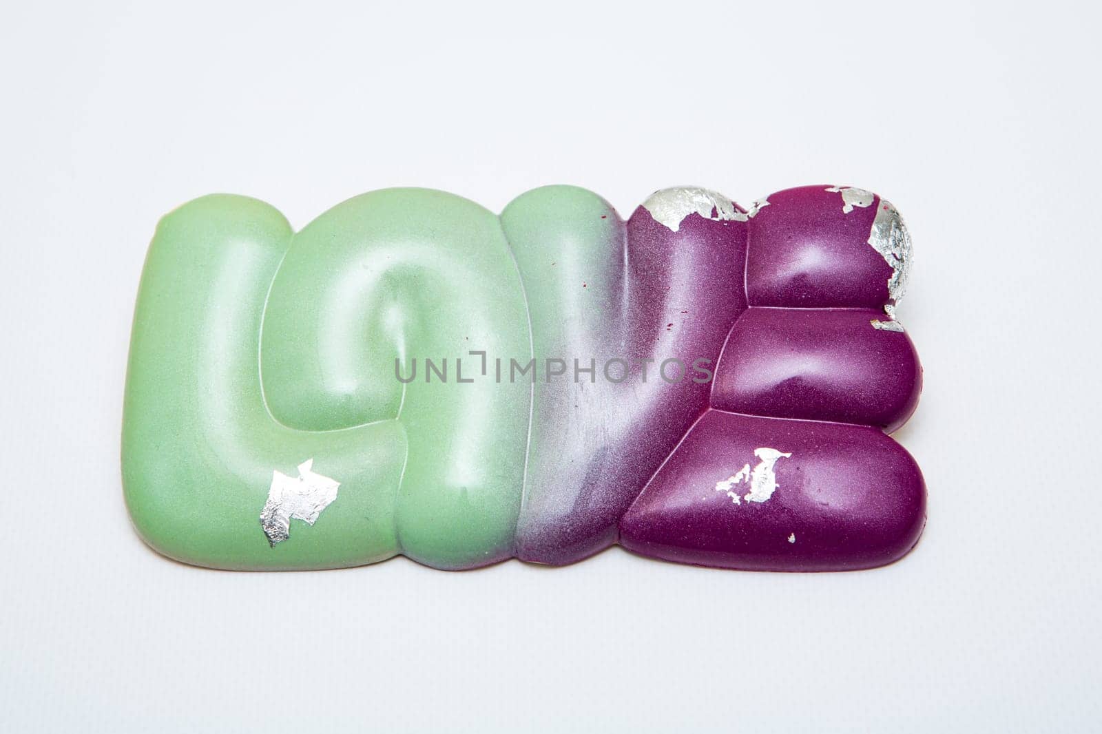 Delicious chocolate candies, close up, different colors.