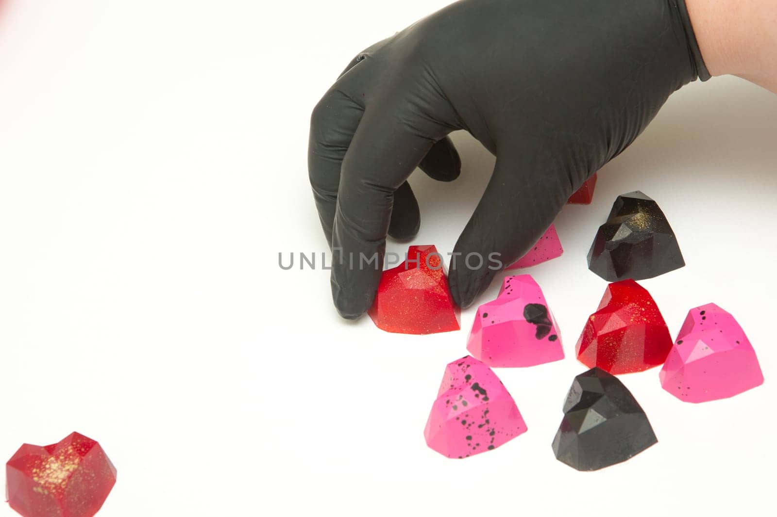 Delicious chocolate candies, close up, different colors.