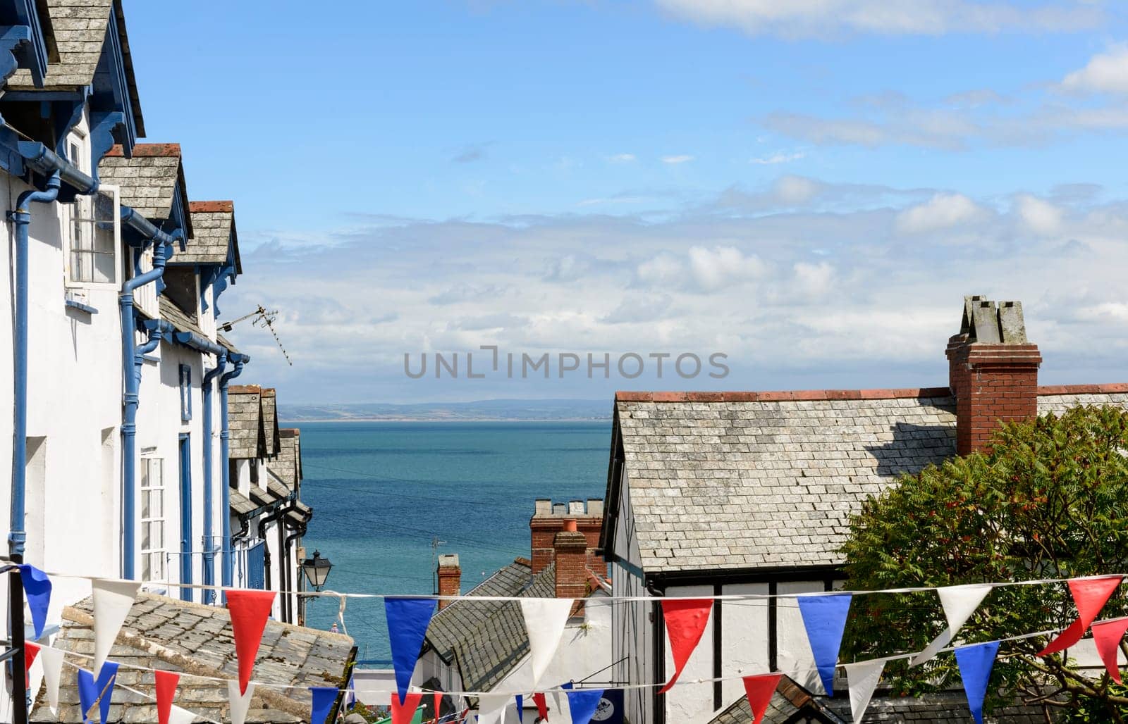 foreshortening of historic fishing village on Devon northern coast.