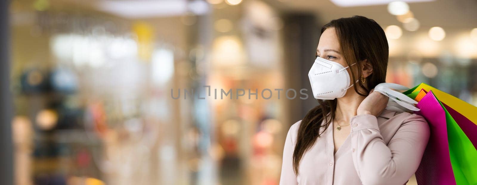 Customer In Fashion Store Wearing FFP2 Face Mask