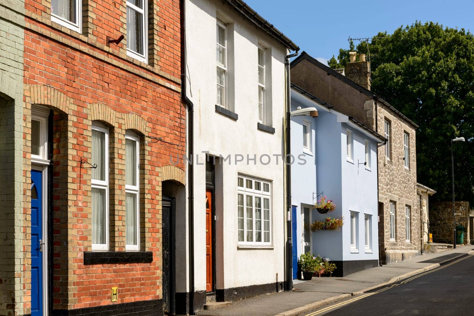 view of  street with old houses in the touristic village in the Dartmoor region.