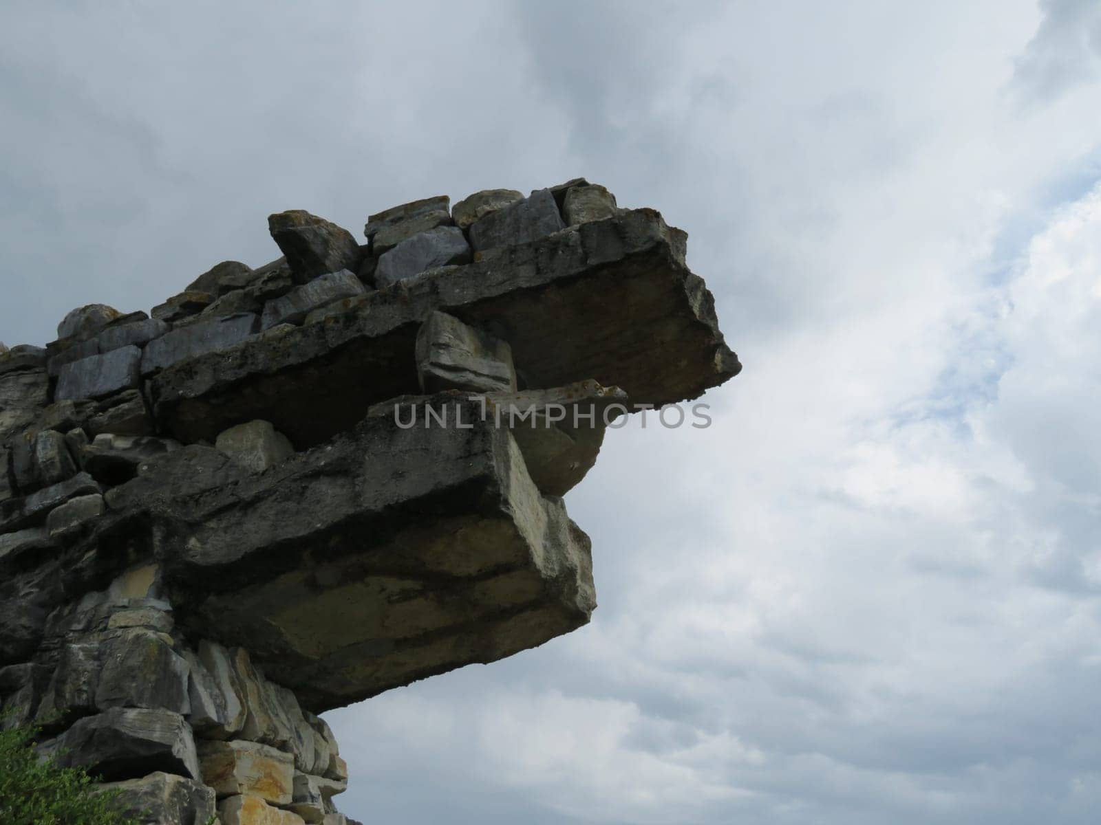 beautiful dragon-shaped stone wall coming out of the earth