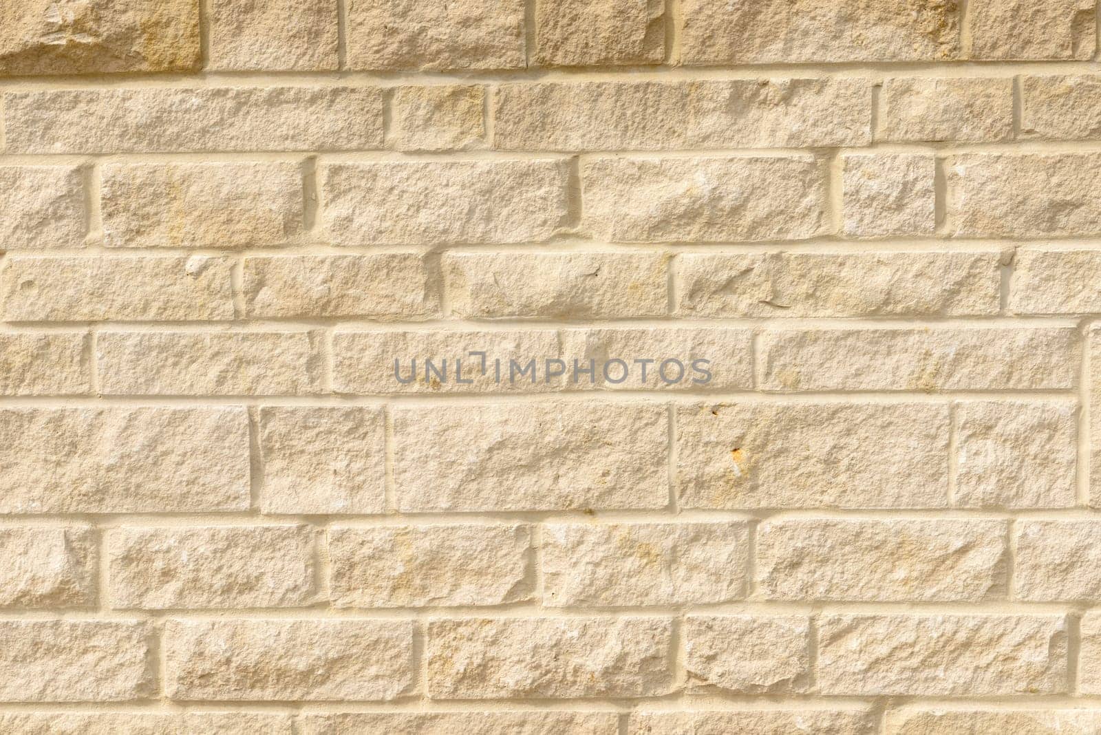 detail of wall built with blocks of white Portland stone.