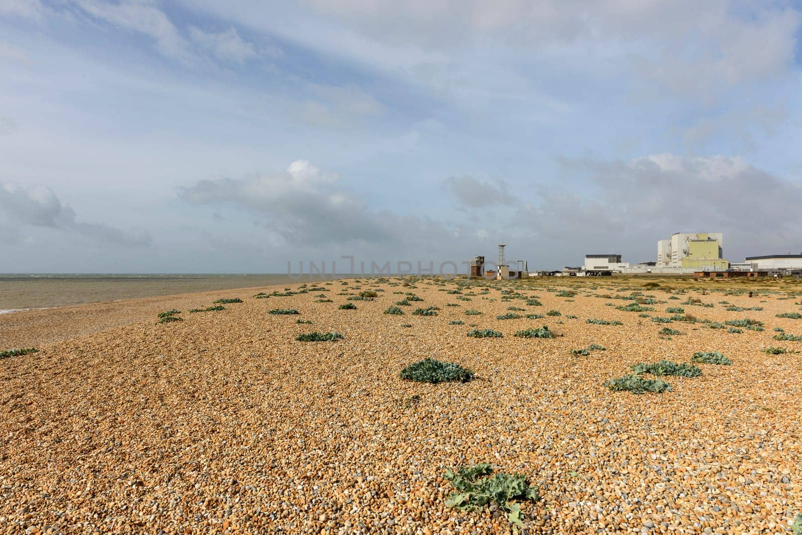 view of the buildings of nuclear plant on the shingle beach at Dungedness,  Romney Marsh, Kent.