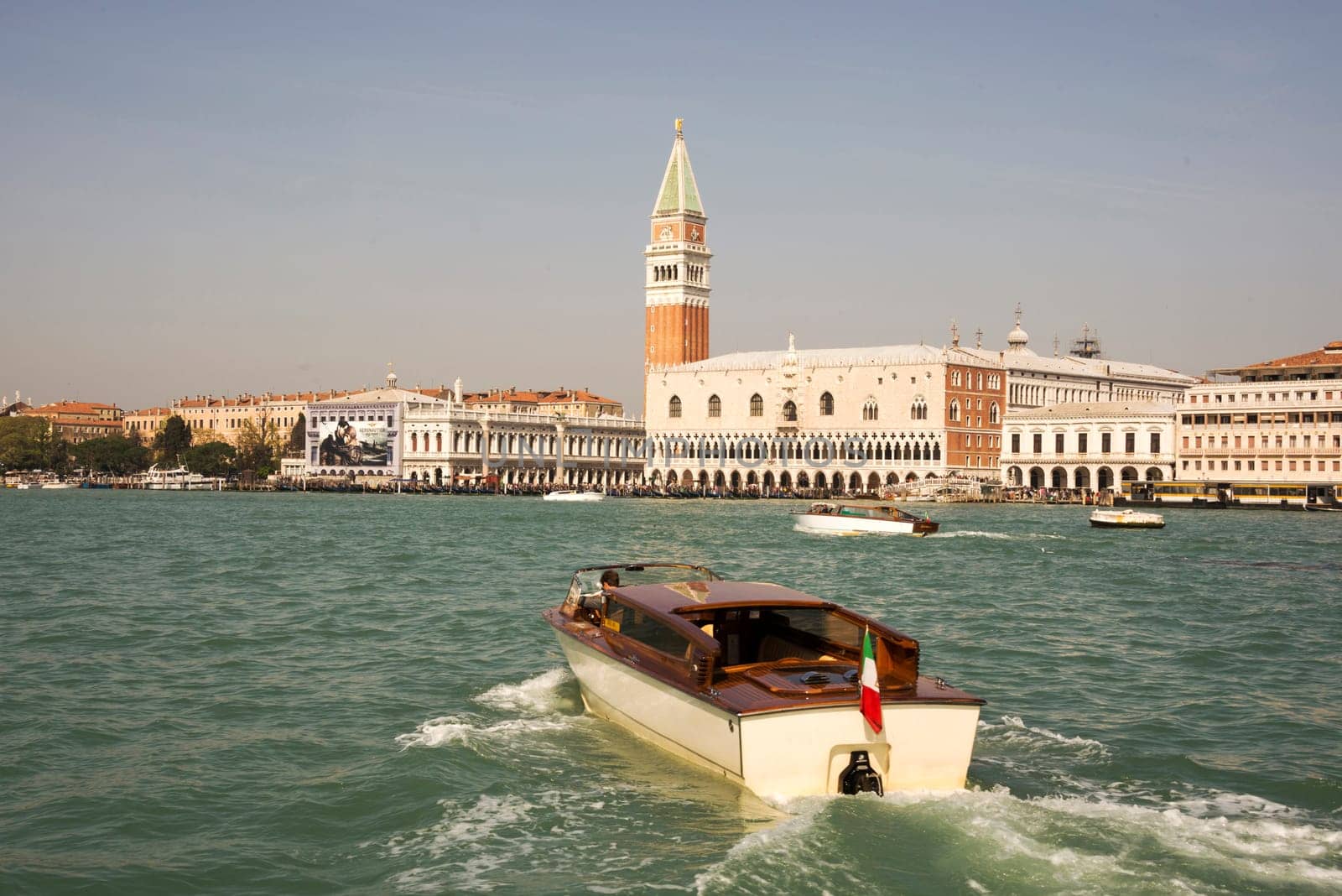 Venice, Italy- March 30, 2014:Vessels running captains sail on the Grand Canal