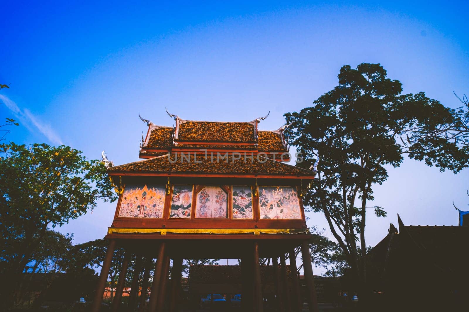 Hall of ancient Tripitaka in the pool. Thai traditional building beautiful ancient art and architecture. Ancient town