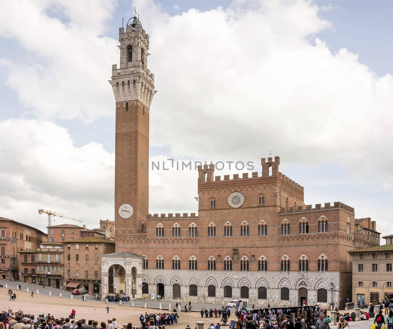 Tourists visiting the sights of the Piazza del Campo.Siena.Italy
