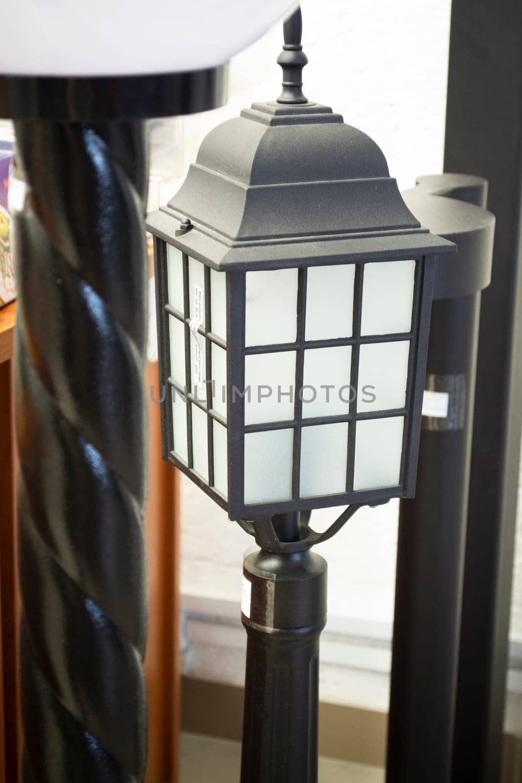 street forged metal lanterns. Classic garden led lamp. Close up
