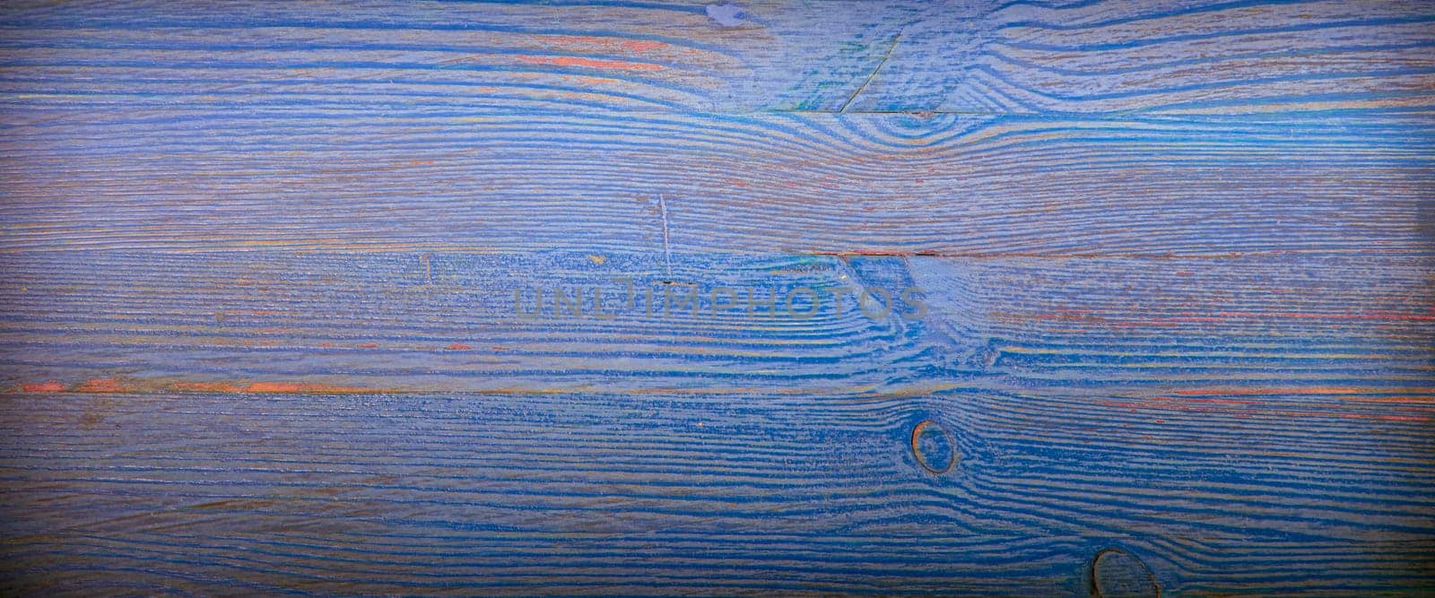 Old wooden background with horizontal blue boards. layout, space for text and logo.