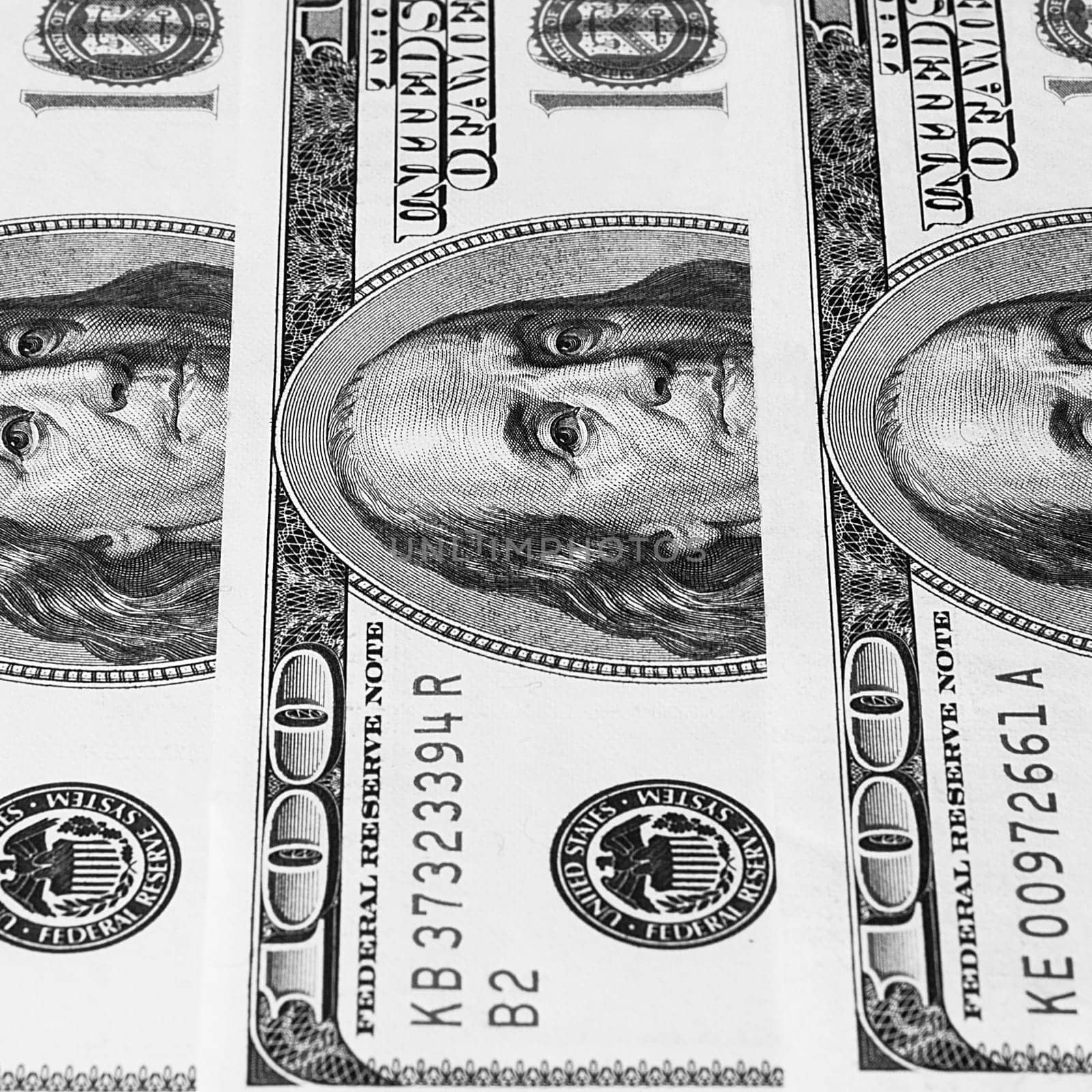 Banknotes of dollars are stacked in a row, background.
