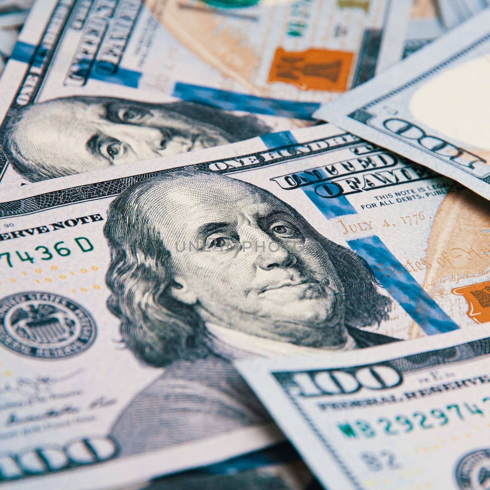 A hundred American banknotes are scattered. cash hundred-dollar bills, dollar background image.