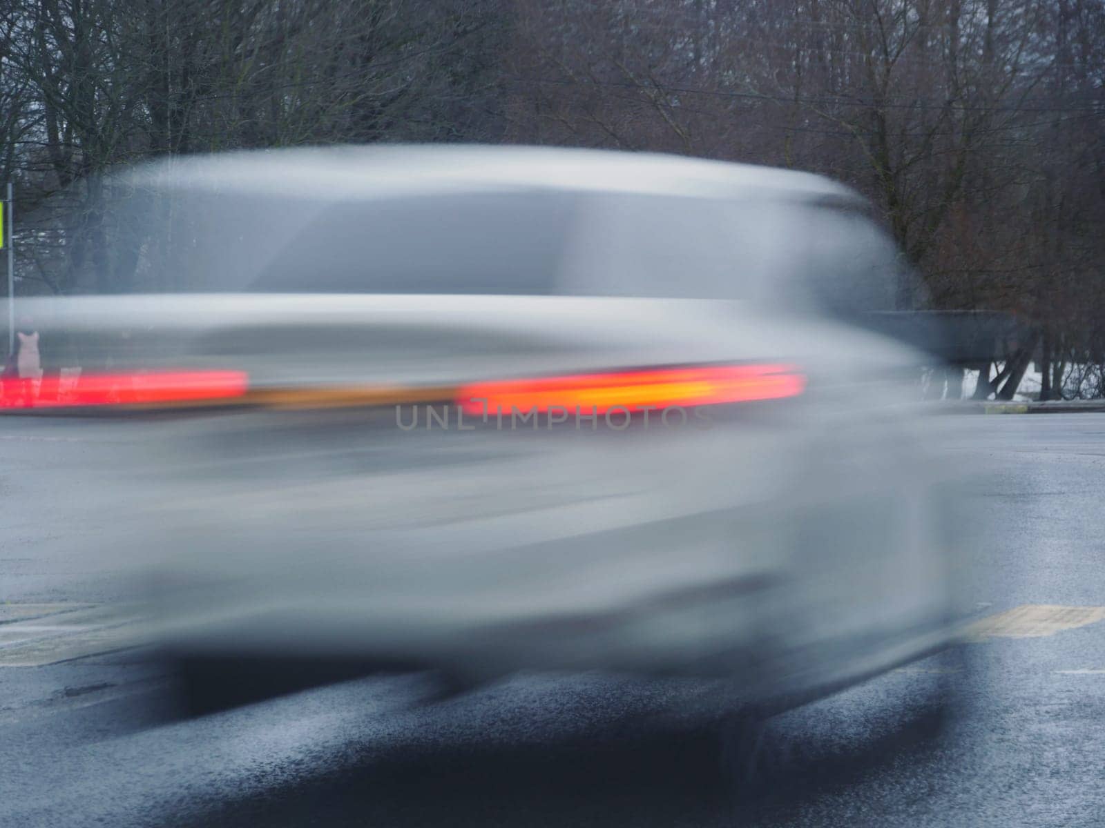 high speed, car passing by blurred motion