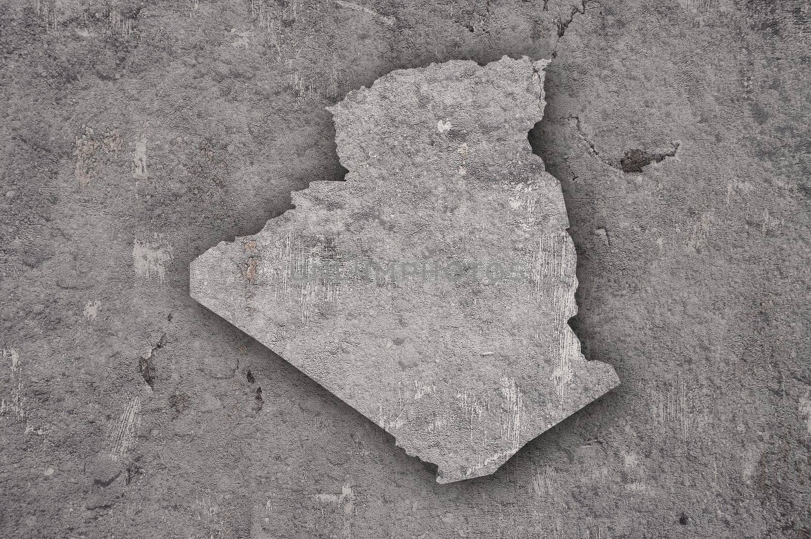 Map of Algeria on weathered concrete