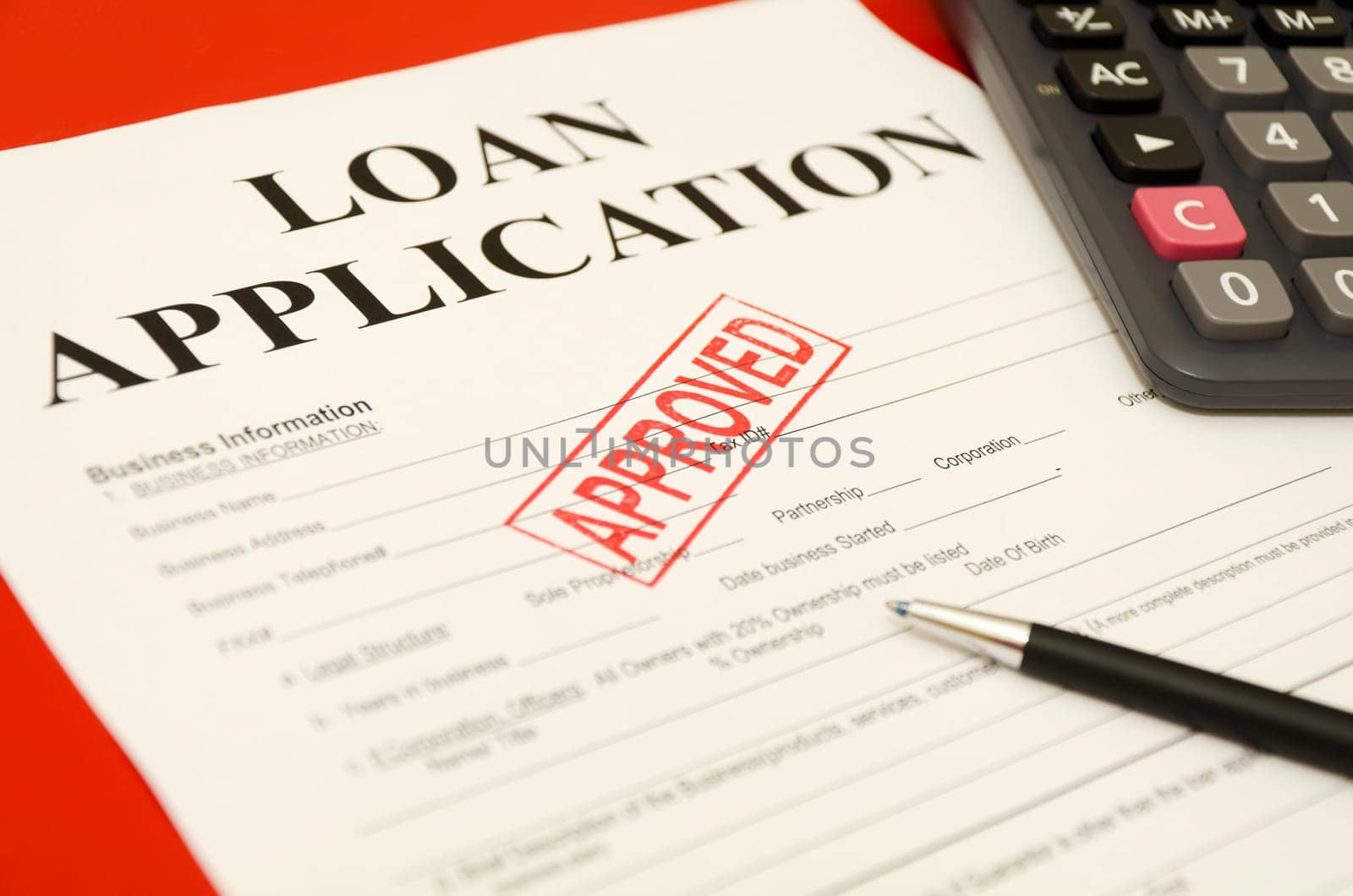 Stamp printed on the approved loan application approved.